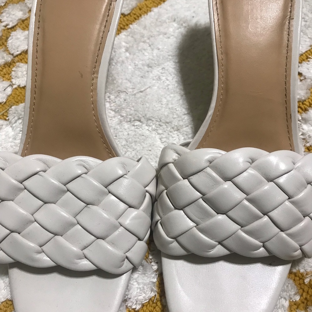 White slides with a kitten heel